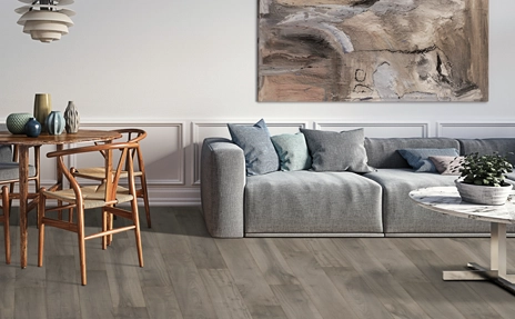 Laminate  flooring with gray sofa